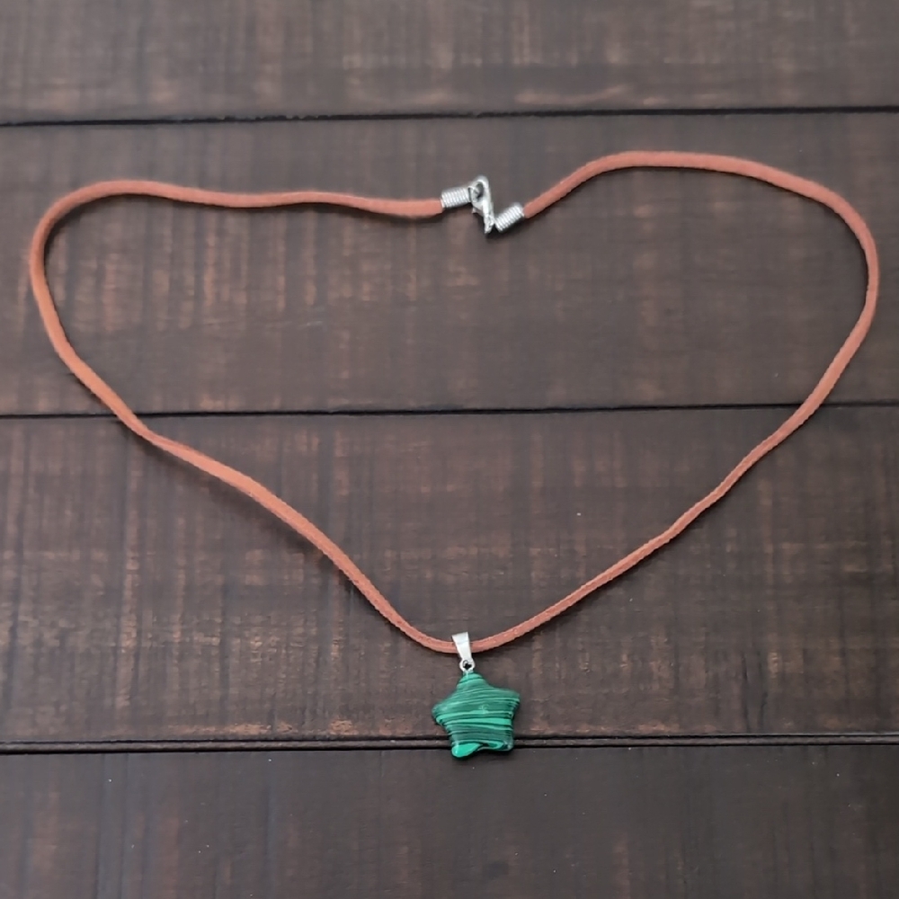 Green Star Pendant on Brown Cord Necklace